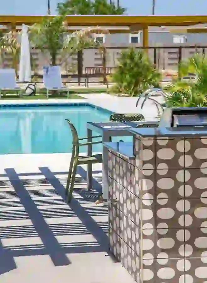Fire up the grill and play a round of corn hole with your crew